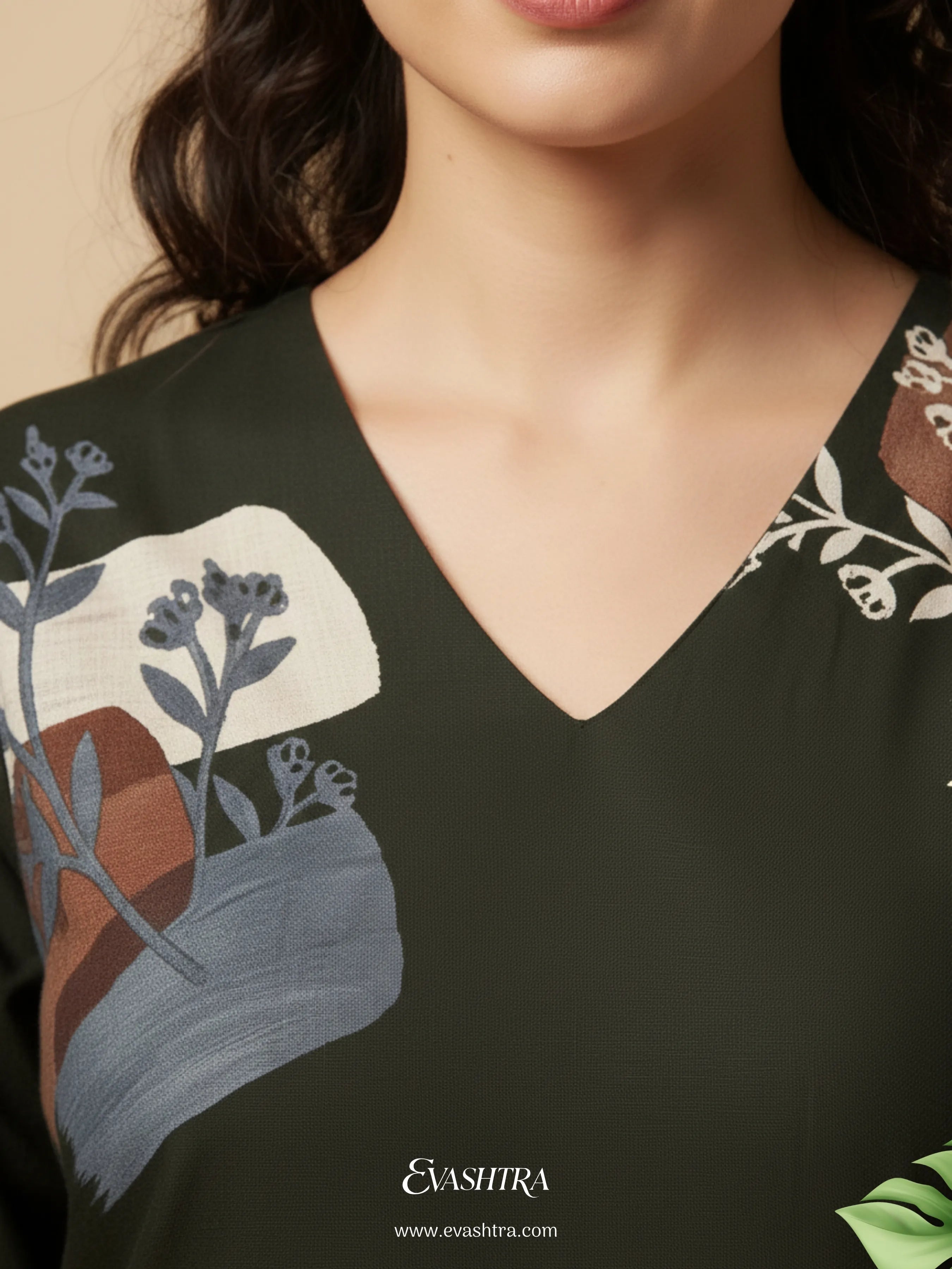 Black V-neck shirt with nature-themed design and 'Evasitra' branding.