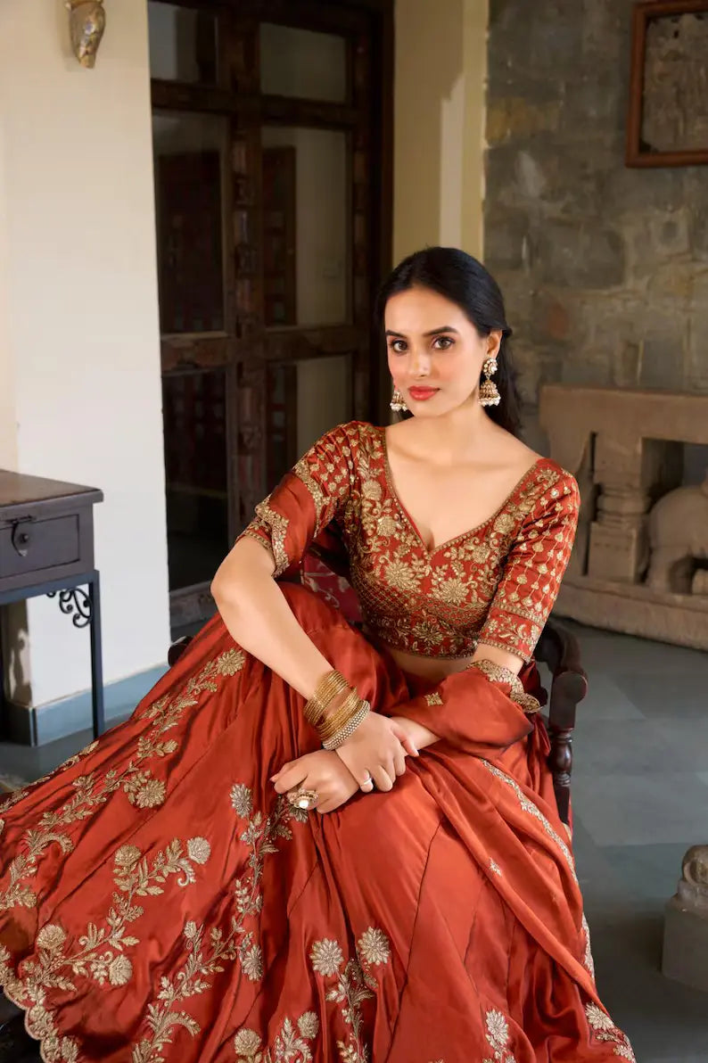 Orange Color Wedding Wear Rangoli Silk Lehenga Choli