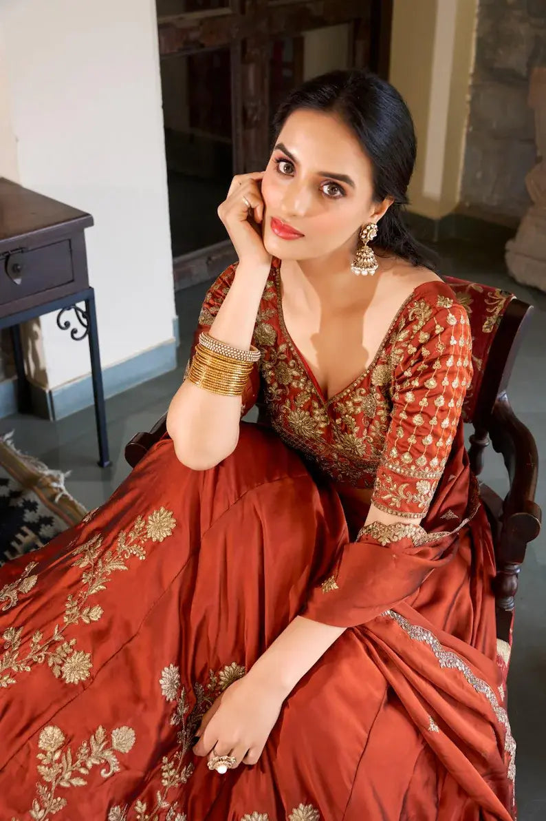 Orange Color Wedding Wear Rangoli Silk Lehenga Choli